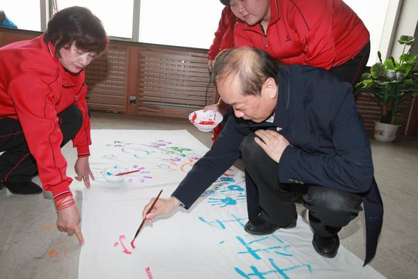 图为自治区残联党组书记、理事长周俊林同志为活动题字.jpg